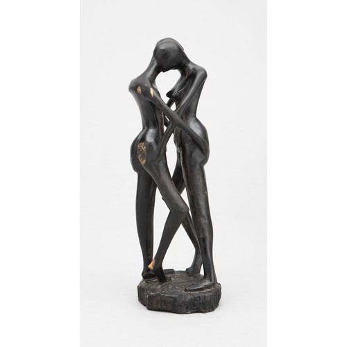 206 - A WOOD CARVED SCULPTURE OF A COUPLE