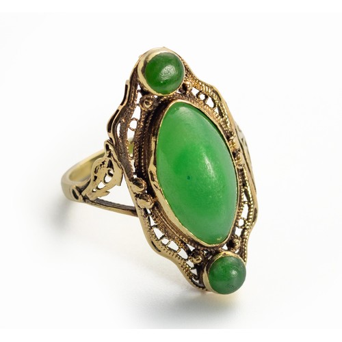 396 - A GOLD AND JADE RING