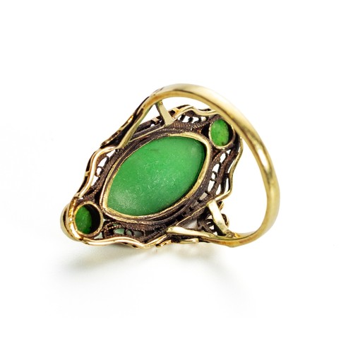 396 - A GOLD AND JADE RING