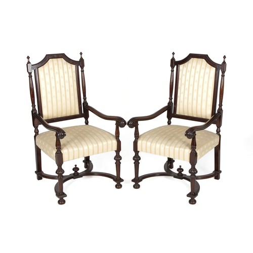 1226 - A PAIR OF EBONISED ARMCHAIRS