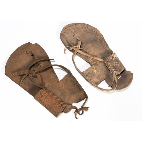 538 - Property of a CollectorTWO LEATHER SANDALS, SAN PEOPLE