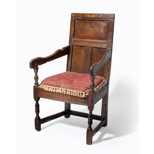 921 - AN OAK ARMCHAIR, 18TH CENTURY
