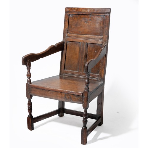 921 - AN OAK ARMCHAIR, 18TH CENTURY
