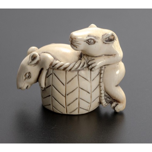 649 - A JAPANESE CARVED 'RAT GROUP' TUSK NETSUKE