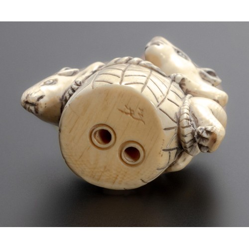 649 - A JAPANESE CARVED 'RAT GROUP' TUSK NETSUKE