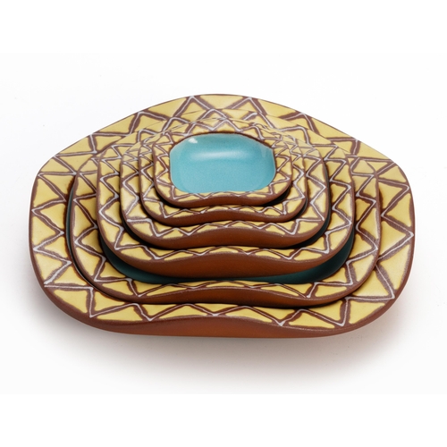 522 - A SET OF SIX KALAHARI STUDIO STACKING DISHES