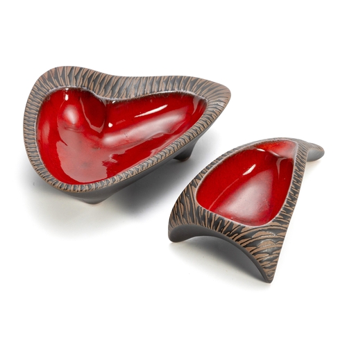 520 - TWO THREE-FOOTED KALAHARI STUDIO ORGANIC-SHAPED BOWLS