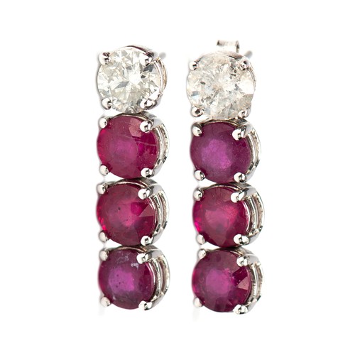 438 - A 3.50 CARAT PAIR OF NATURAL DIAMOND AND RUBY EARRINGS