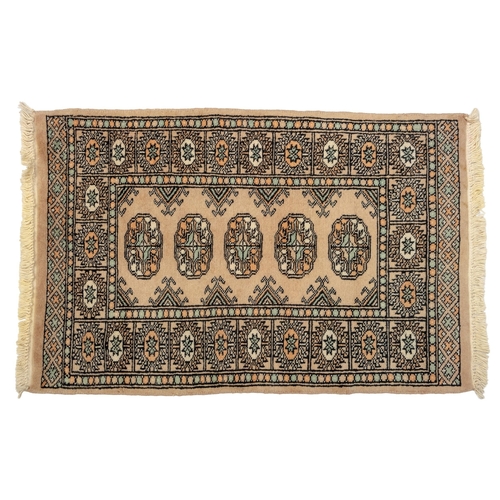 12 - A BOKHARA RUG 93 by 62cm