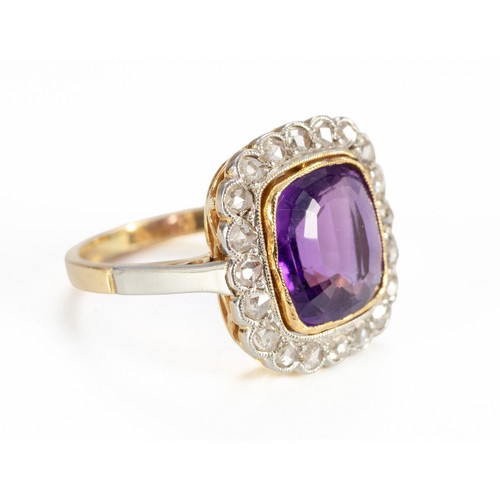 1438 - A NATURAL DIAMOND AND AMETHYST DRESS RING