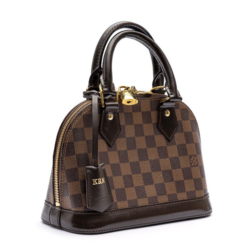 713 - A LOUIS VUITTON DAMIER EBÈNE ALMA BB HANDBAG