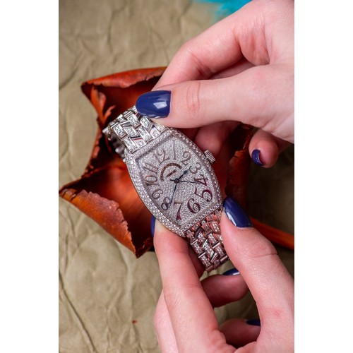 13 - A FRANCK MULLER NATURAL DIAMOND WRISTWATCH