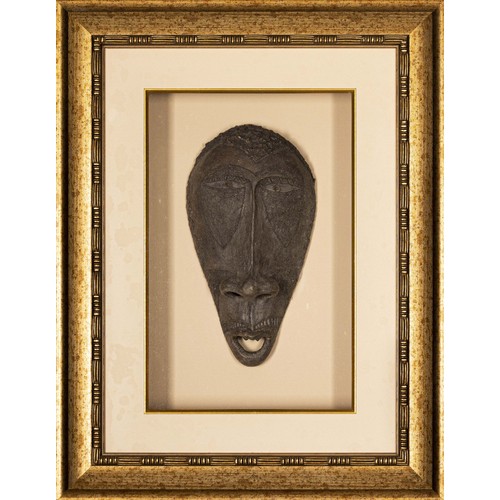 56 - AN AFRICAN ART MASK SHADOW BOX