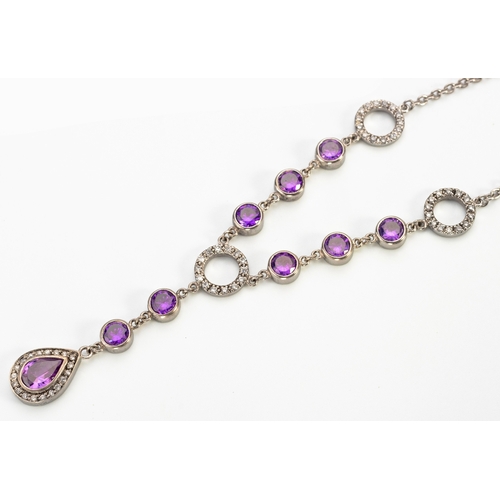 48 - A SILVER AND GEMSTONE NECKLACE