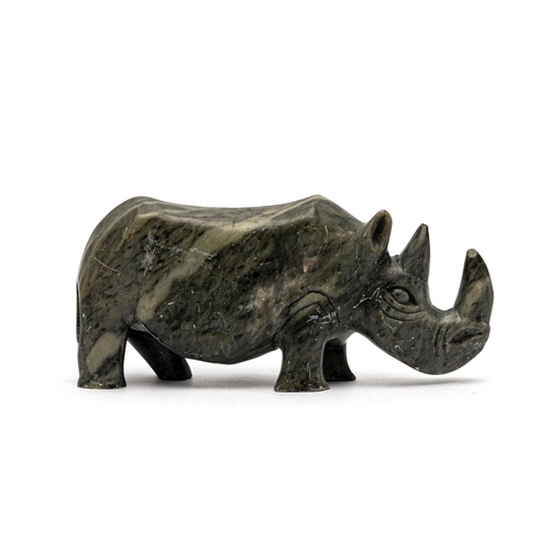 30 - AN AFRICAN CARVED SERPENTINE SCULPTURE OF A RHINOCEROS&nbsp;