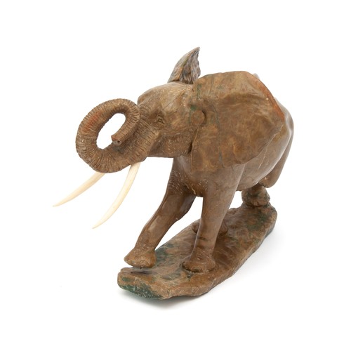 29 - A FIGURAL STATUE OF A STONE CARVED ELEPHANT