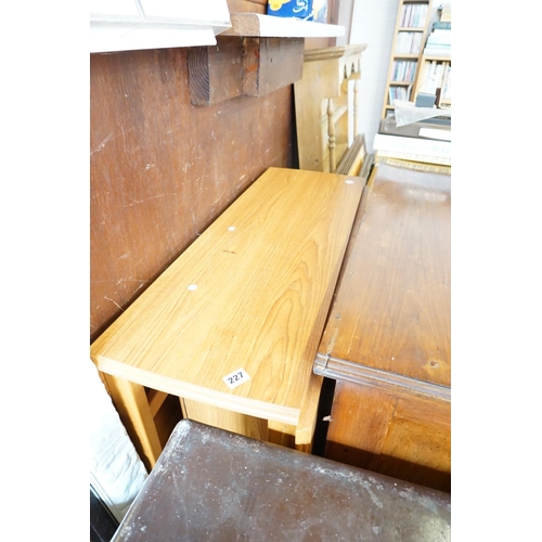 227 - A drop leaf kitchen table with central compartment underneath