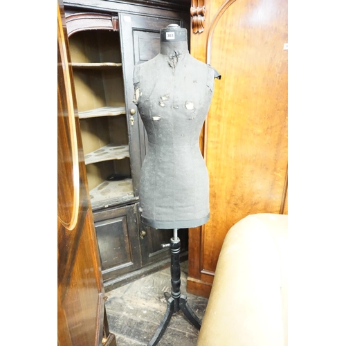 303 - A mannequin on stand