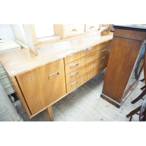 336 - A sideboard with cupboards and drawers - circa 1970/80's