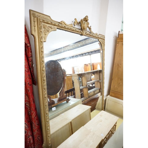 343 - A decoratively framed large over mantle mirror