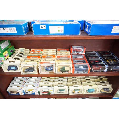 538 - A collection of boxed model vehicles - (second shelf)
