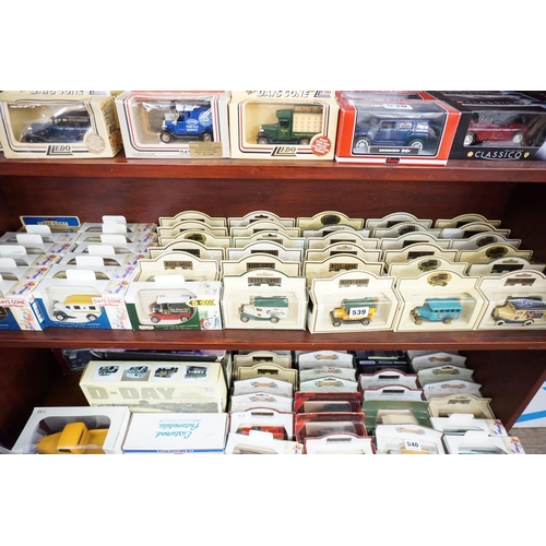 539 - A collection of boxed model vehicles - (third shelf)