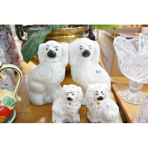 557 - 2 pairs of spaniel farings, one pair is Beswick