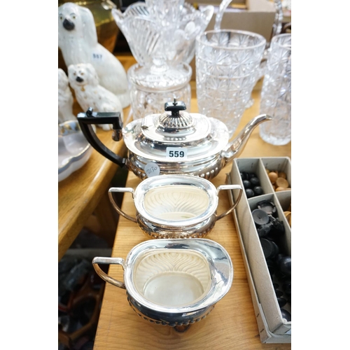 559 - Plated teapot, sugar bowl and milk jug