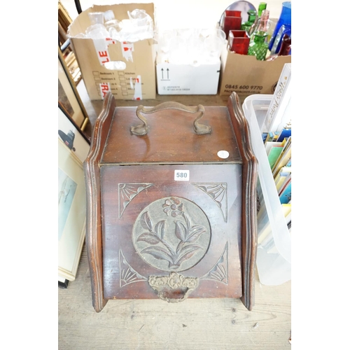 580 - A wooden coal box