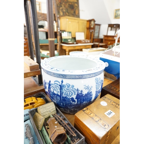 583 - A blue and white decorative planter