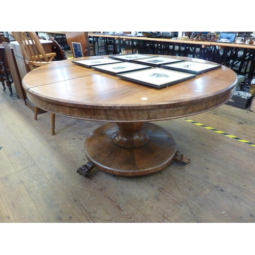 156a - A Victorian circular breakfast table with pedestal support, claw feet