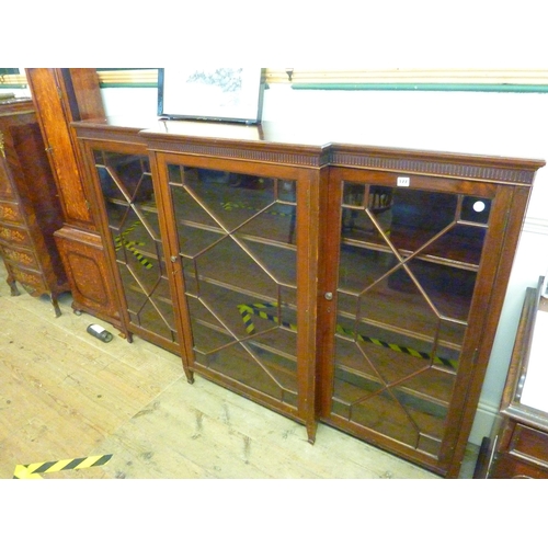 177 - A good quality mahogany breakfront bookcase with astrogal glazing and adjustable internal shelves