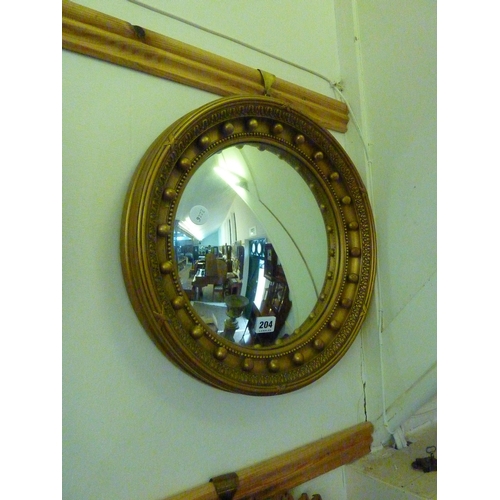 204 - A convex wall mirror