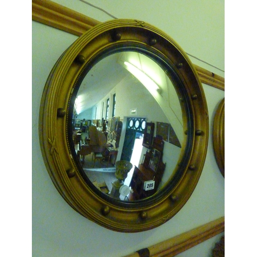 205 - A convex wall mirror