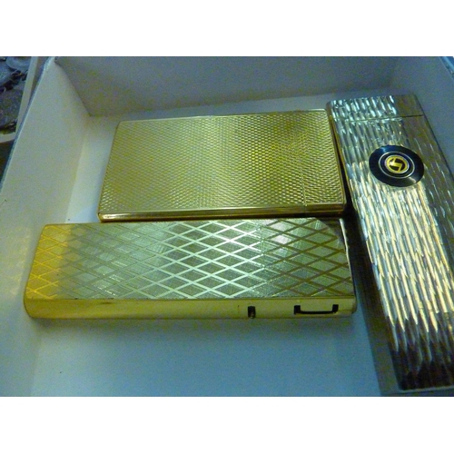 574 - 2 Calibri lighters and a Sarome lighter