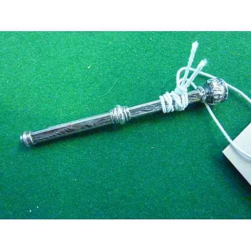 579 - A silver propelling pencil with semi precious stone to the end