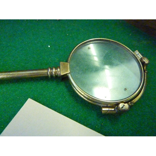 584 - A pair of folding mechanical glasses