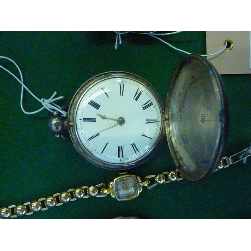 585 - A silver cased pocket watch with cover to the dial