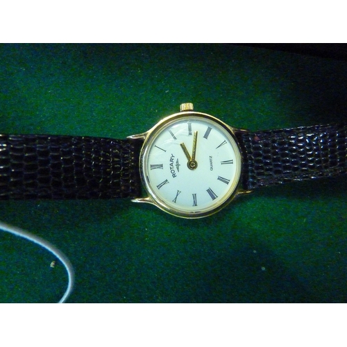 591 - A 9ct gold Rotary ladies wrist watch with leather strap