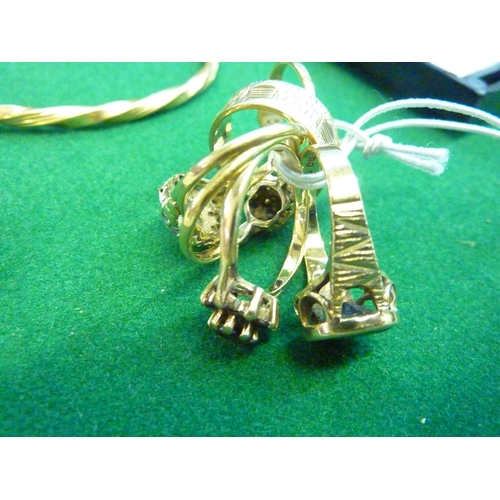 602 - An assortment of gold rings