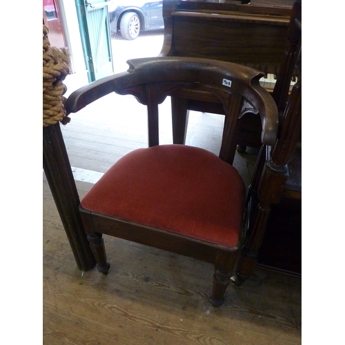 196b - An unusual heavy oak tub chair