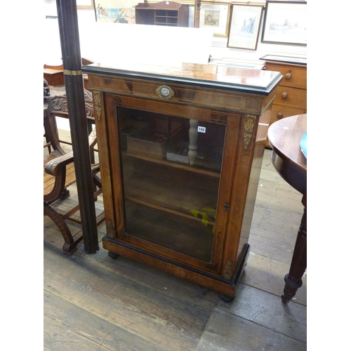 142 - A good quality Victorian walnut pier cabinet with applied brass work & inlaid detail porcelain roset... 