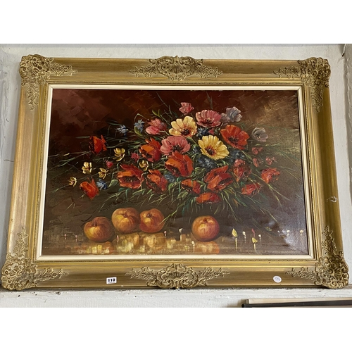 110 - A decoratively framed oil painting - a still life of poppies and fruit