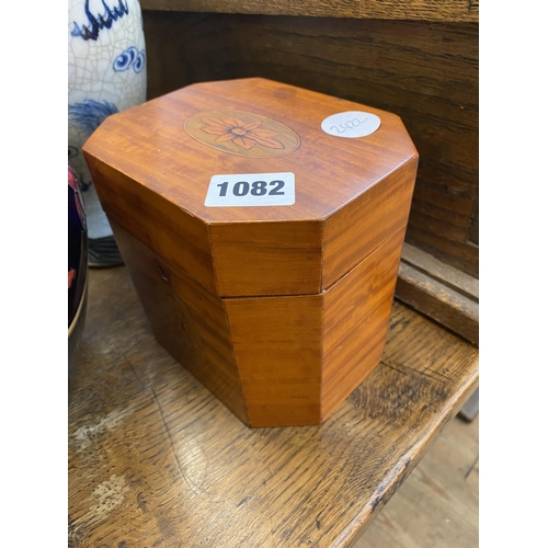 1082 - A satinwood octagonal caddy box