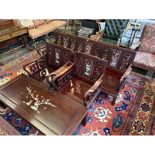 14b - An Oriental export hardwood suite with mother of pearl inlaid panels and carved detail comprising se... 