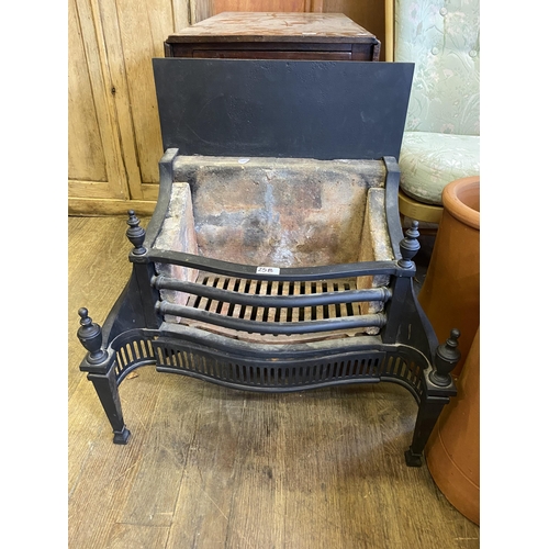 25b - A heavy cast iron fire basket