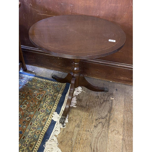 32a - A mahogany circular tripod side table