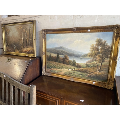 4 - 2 oil paintings on canvas in decorative frames - one of an upland lake scene, the other of a woodlan... 