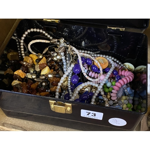 73 - A box of assorted costume jewellery