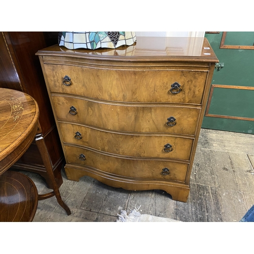 150 - A serpentine fronted walnut reproduction chest of drawers